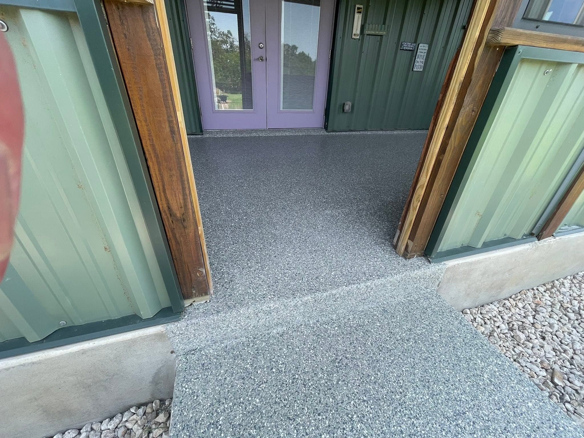 Flake coating at the back porch doors
