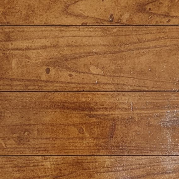 AI-rendered Caramel Plank scored wood-look stained concrete sample chip