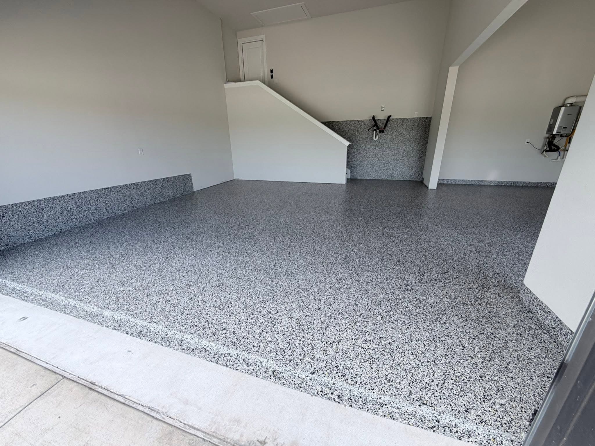 Domino flake at the garage door line with the sealed edge coat