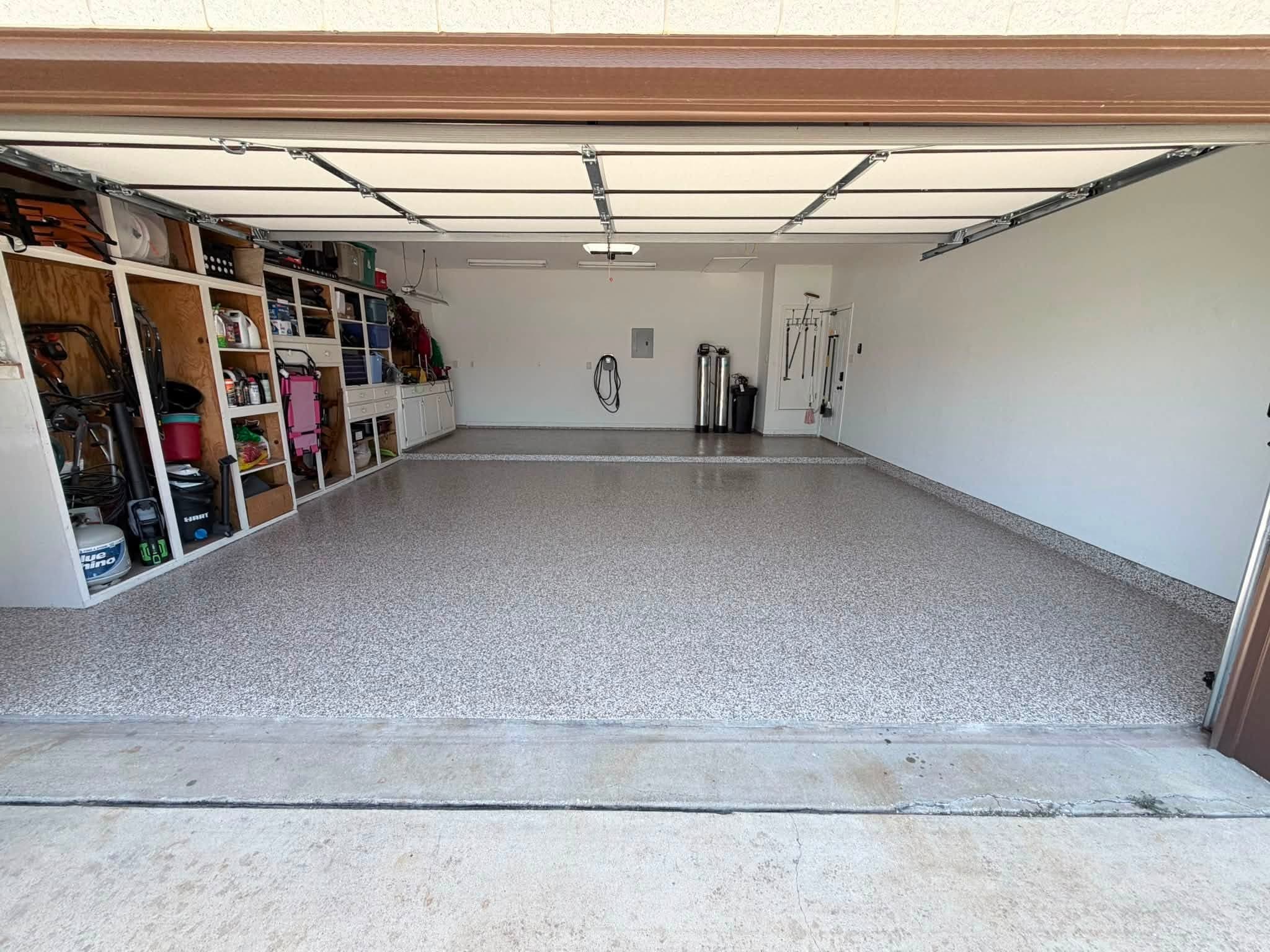 The same garage finished in a clean gray and white flake floor
