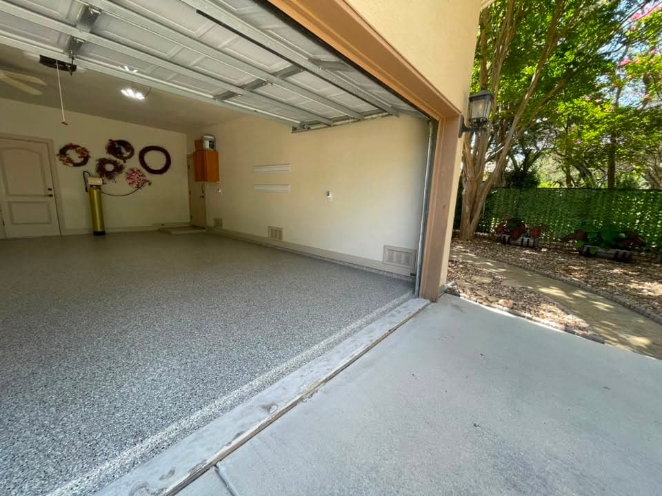 Finished flake garage floor running back to the interior door