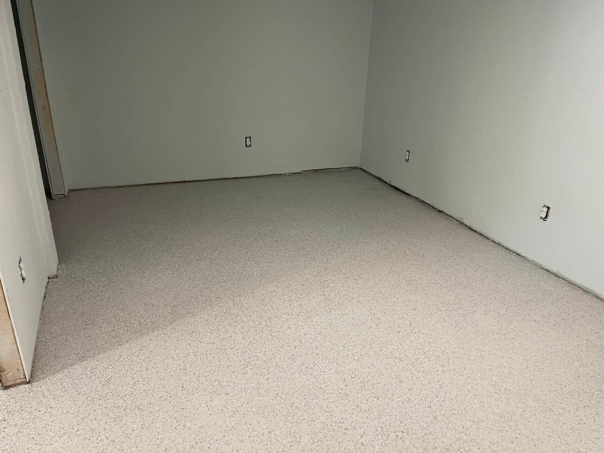 Light flake interior floor in an open room