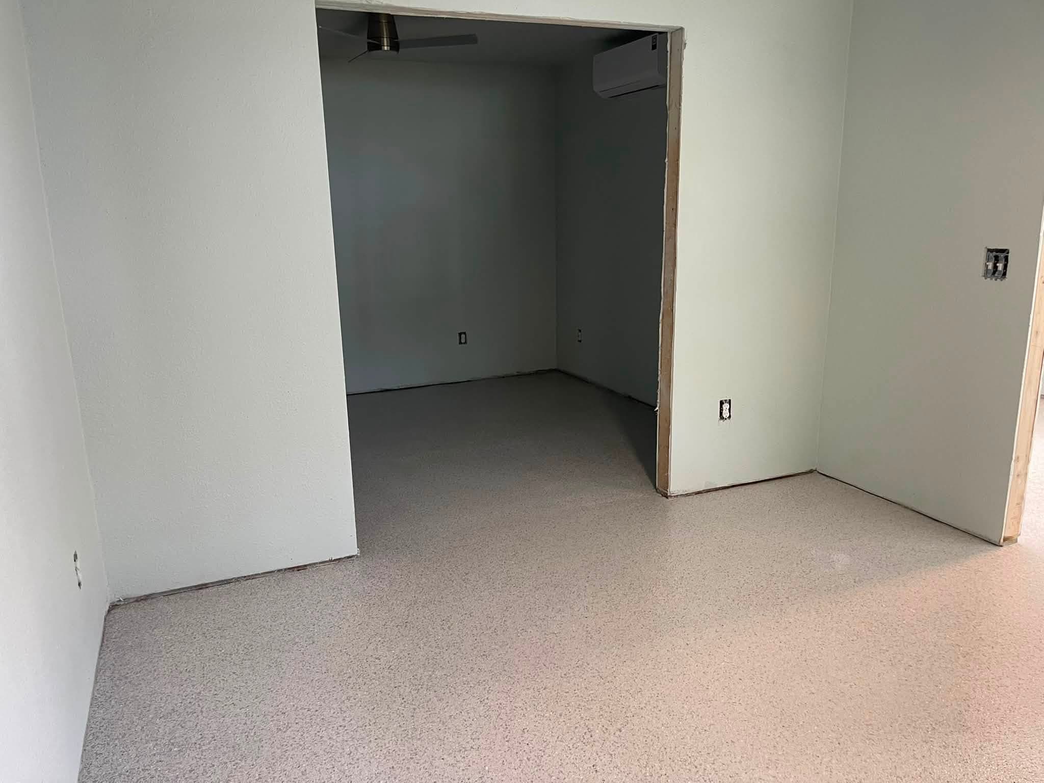 The same flake floor running room to room
